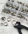 Heavy Duty PEX Clamp Set With Pliers 130 Piece Pro Grade Stainless Steel Hose Clamps Kit shown with black pliers