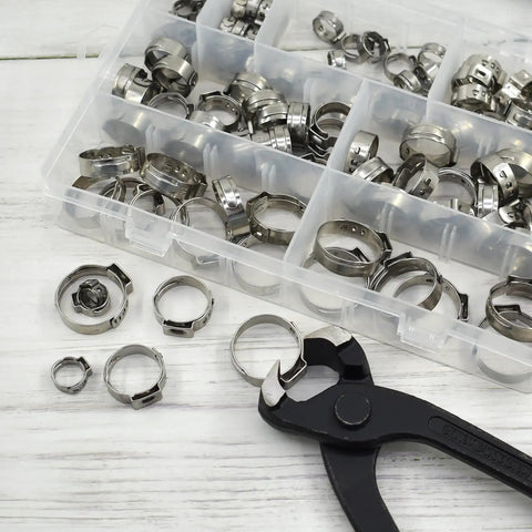 Heavy Duty PEX Clamp Set With Pliers 130 Piece Pro Grade Stainless Steel Hose Clamps Kit shown with black pliers