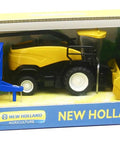 One Sixty Two Scale Harvester RF850 And Trailer Die Cast Farm Toy Set in packaging, yellow harvester, blue trailer visible