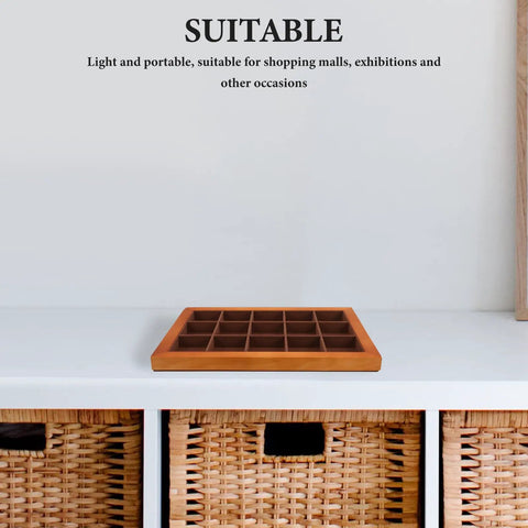 Sleek Walnut Jewelry Organizer Tray With 15 Slot Grid For Ring Bracelet Necklace Storage And Display on a white table.