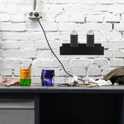 Wall Mount Spray Can Holder And Tool Rack Heavy Duty Metal Storage Shelf with aerosol cans on white brick wall.