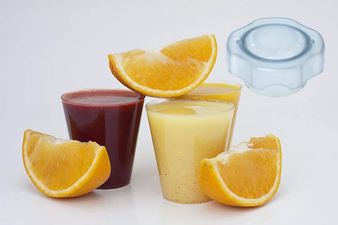 Juice glasses with oranges and a Lid Plug Replacement For Low Profile 64 Oz Blender Container Fits Pro750 Pro300.