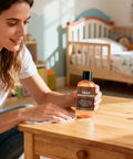 Woman using All In One Teak Wood Cleaner And Restoration Kit With Brightener For Indoor Outdoor Furniture Marine Decks And Patios