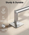 Close-up of wall-mounted towel bar with water droplets, rustproof stainless steel, brushed nickel finish, sturdy and durable.