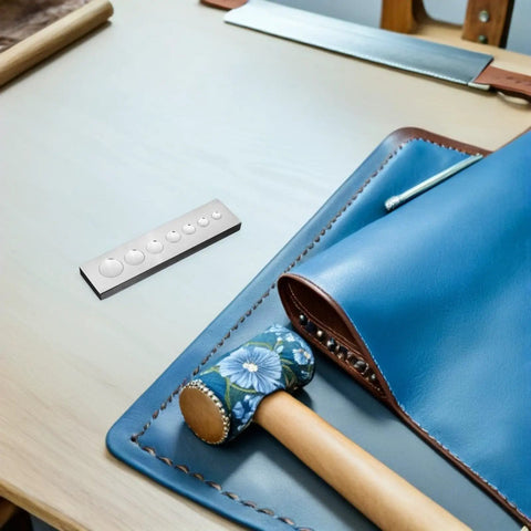 Top Notch 2-Piece Rivet Setting Tool With Durable Stainless Steel Base For Serious Crafters! This Cool 7-In-1 Multi Function Riveter Kit Makes Secure Fastening And Precision Alignment Super Easy On Metal, Leather, Or DIY Projects Without Breaking The. 2-piece stainless steel rivet setting tool and base on blue leather craft mat