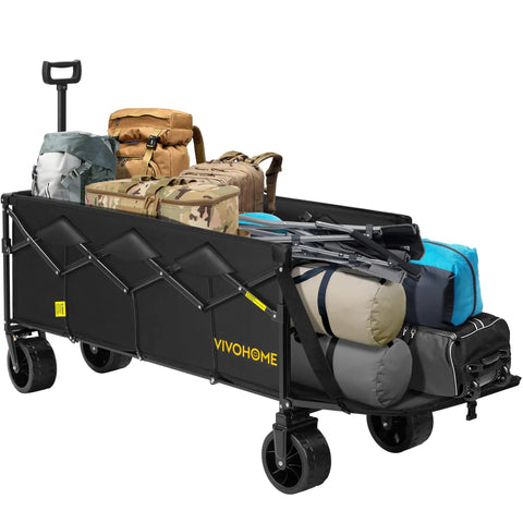 Heavy Duty Collapsible Wagon Cart With 440 Lbs Capacity loaded with camping gear, showing extended tailgate and all terrain beach wheels.