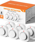 Battery Operated Photoelectric Smoke Alarm With Test Button And Low Battery Warning, Dual Sensor Fire Detector For Home Safety, No Hassle Install And Fewer False Alarms From Kitchen Steam, Six Pack displayed in front of packaging box.