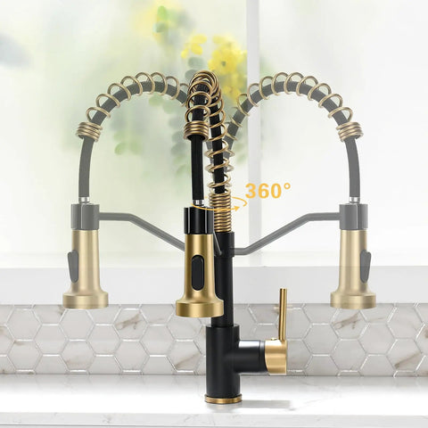 Close-up of Badass Matte Black Kitchen Faucet With Sleek Gold Accent Pull Down Sprayer, 360° swivel, ideal for farmhouse sinks.