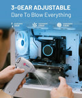 Person using Beast Mode 250,000 RPM Air Duster with Ergonomic Grip to clean computer motherboard.