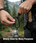 Heavy Duty Black Carabiner Clip Built Tough For 900lbs, 3 Inch Steel D Shaped Snap Hook used on bottle in outdoor setting