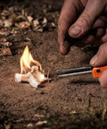 Hands using Easy Light Tinder for Camping and Survival, Natural Wood Fiber Tinder That Lights Up Fast, Waterproof Fire Starter