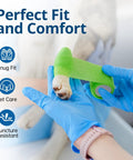 Person wrapping dog's paw with green bandage wearing Blue Nitrile Exam Gloves Disposable Latex Free Non Sterile Medical And Food Safe Powder Free 100