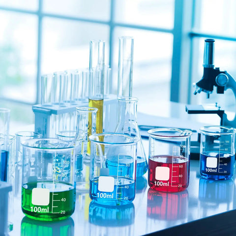 24 Pack 100 Ml Borosilicate Glass Lab Beakers With Spouts, filled with colorful liquids in a lab setting, durable and reusable