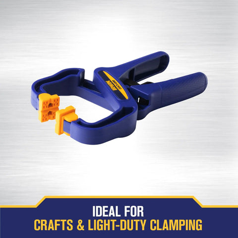Quick-Grip Handi-Clamp One And A Half Inch One-Handed Clamp in blue and yellow for woodworking projects, sturdy handle visible