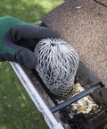 Installation of Sturdy No Fuss Six Pack Stainless Steel Downspout Covers That Expand To Fit Most Gutters Rust Resistant Gutter Guards For Leaves Debris And Rodent Prevention Today in a gutter.