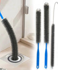 Heavy Duty All In One Drain Brush And Sink Snake Kit With Flexible Auger cleaning drain with a long brush in a bathroom sink.