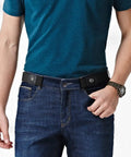 Man wearing No Buckle Elastic Belt For Men, Stretch Buckle Free Jeans Belt, 1.38 Inch Wide, Black, showing front view with blue jeans.