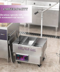 KYTGFH Commercial Deep Fryer Oil Filter Machine 250W Pump with 18L capacity in a professional kitchen setting.