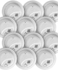 Hardwire Interconnect Smoke Alarms With Battery Backup 12 Pack arranged, showing white circular units with vents.