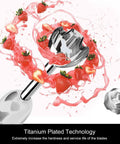 Titanium-Reinforced 3-In-1 Immersion Hand Blender With Copper Motor, blending strawberries to demonstrate sharp blade efficiency.