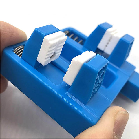 Close-up of adjustable heat resistant soldering jig with durable jaw fixture for rock solid no slip precision soldering.