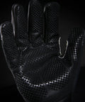 Close-up of Heatworx Heavy Duty Heat Resistant Gloves With Silicone Palm, Kevlar Liner And Shell, in black, showing grip pattern.