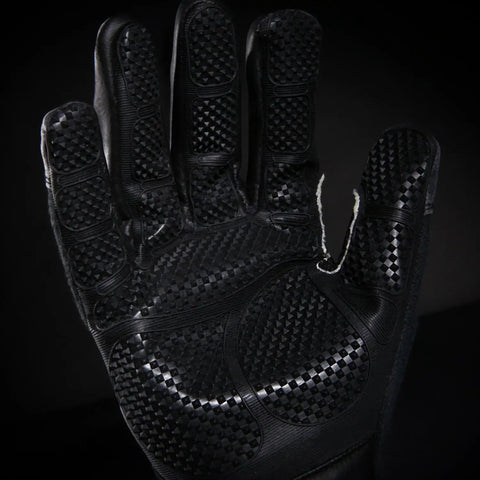 Close-up of Heatworx Heavy Duty Heat Resistant Gloves With Silicone Palm, Kevlar Liner And Shell, in black, showing grip pattern.
