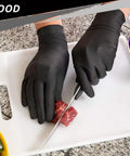 Nitrile Disposable Gloves 4 Mil, 200 Count, Powder Free and Latex Free, used for food prep on cutting board with knife.