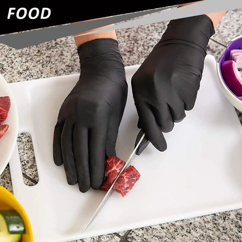 Nitrile Disposable Gloves 4 Mil, 200 Count, Powder Free and Latex Free, used for food prep on cutting board with knife.