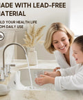 Mother and child using Chrome 8 Inch Widespread 3 Hole 2 Handle Waterfall Bathroom Sink Faucet With Metal Pop Up Drain.