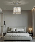 Modern Crystal Drum Chandelier With Six Beaded Crystals, 14.9 Inch Ring Pendant Ceiling Light in a bedroom setting.