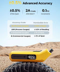 Side view of yellow HYVOHEX digital tire pressure gauge with LED display on a tire
