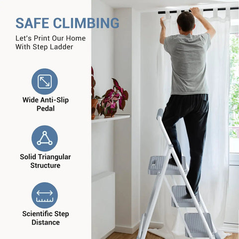 Person using Three Step Stool With Anti Slip Pedals And Comfortable Handrail, Heavy Duty Portable Step Ladder For Kitchen Garage And Outdoor Use, 800 Lb Capacity, Foldable Slim Design, Gray, Easy To Carry to reach curtain