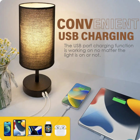 Set Of 2 Bedside Lamps With USB Port, 3 Way Dimmable Touch Control, Black Round Fabric Shade shown beside charging devices.