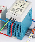 Variable power supply setup with 720 Piece Heat Shrink Tubing Kit With 8 Size Assortment In A Durable Box showing colorful wires.