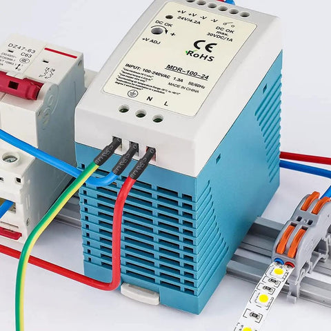 Variable power supply setup with 720 Piece Heat Shrink Tubing Kit With 8 Size Assortment In A Durable Box showing colorful wires.