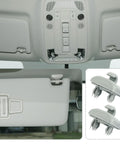 Audi Sun Visor Clips Replacement Kit, 2 Pcs, OEM 8E0857562 8U0857562A, Gray visor clips installed in vehicle interior.