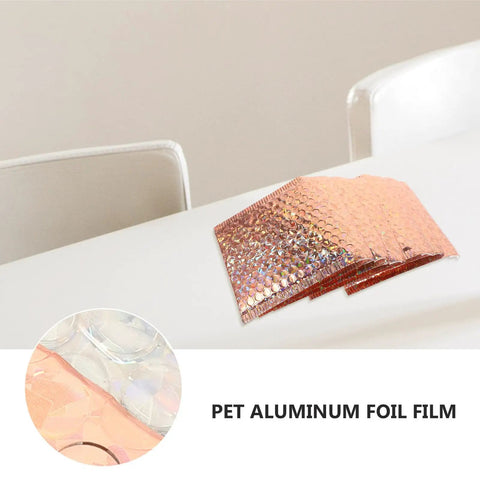 Rose gold 20 pack air cushion mailers 15x13cm on a table, showing PET aluminum foil film detail.