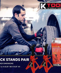 Reliable 2 Ton Automotive Jack Stands with Impressive 4,000 Lbs Capacity in use at a garage side view with packaging.