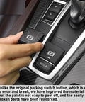 Close-up of BMW Parking Brake Button Replacement Cover Kit installation in center console
