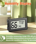 Six Pack Mini Hygrometers For Indoor Humidity And Temperature, Digital Thermometer Monitor With Clear LCD Display, 2 In 1 Sensor, black desk unit showing 66% RH and 77.3°F