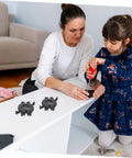 Solid 2 Pack Clamping Mending Plate Brackets For Tabletop Repair And Wood Panel Connector Heavy Duty, two black brackets on table.