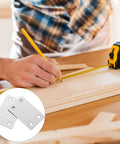 Heavy-Duty Stainless Steel Flat Corner Braces With Screws, 10-Piece Mending Plates Set For DIY Furniture Repairs, on a wood board
