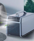 4 in 1 Portable Air Conditioner for Home or Office with Cooling and Heating, Dehumidifier, Quiet Fan, Remote Control and Touch Panel, Compact Swamp Cooler for All Season Comfort in a living room setting.