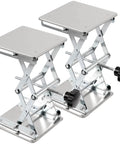 Two stainless steel lab scissor jacks with 8x8 in square platforms; front view, height adjustable 80–270 mm.