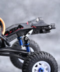 Close-up of Beefed Up Droop Flex Mod Extension Kit with 7075 T6 aluminum flex blades installed on Axial 1 to 30 Scale SCX30 RC Crawler