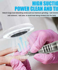 Top Tier Nail Dust Collector Machine With Integrated Lamp And Badass Suction Fan For Manicurists and Home Salon Crews Offering Ten Adjustable Speeds And Ultra Quiet Operation For Crisp Filings, showing the suction unit in use.