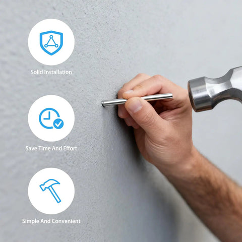 Person hammering a silver finish nail into a wall using tools from the 500 Piece Double Headed Finish Nails And Sleeve Tools For Hidden Trim Nails Baseboard Installation Kit.