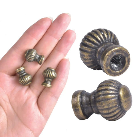 Hand holding Solid Zinc Alloy Mini Cabinet Knobs Bronze Vintage Drawer Pulls Antique Style Hardware, showing sizes and details.