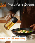 Game Changing Glass Olive Oil Sprayer For Cooking, 16 Oz Dual Pump Dispenser Bottle, Ultra Fine Mist Shaker For Salads And Air Fryer Accessory, Zero Spill BBQ Grill Spray Can With Secure Cap, Matte Black in use to drizzle oil over vegetables.